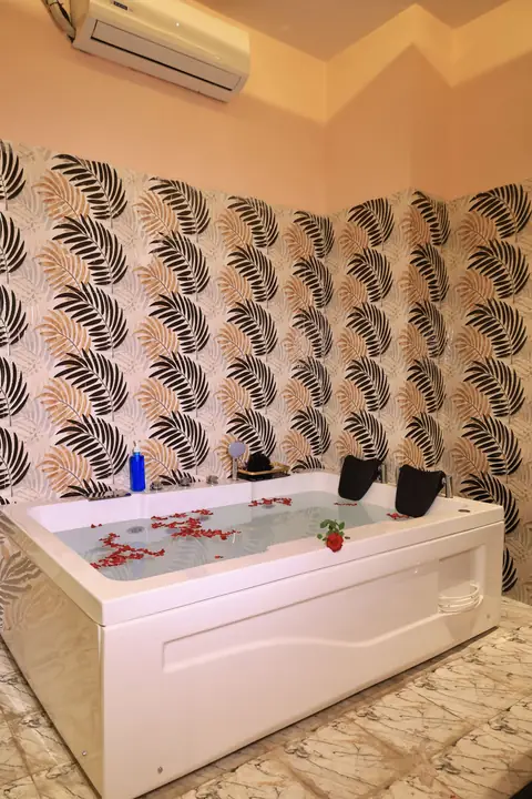 Rose petal jacuzzi bath at Royal Crown Spa near Oberoi Mall