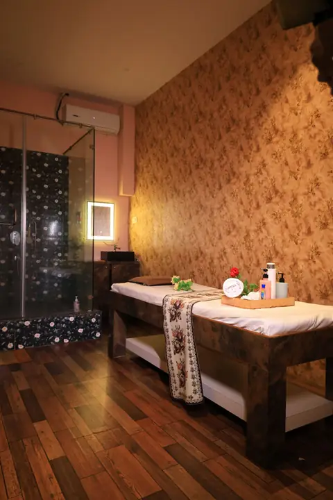 Private massage room with attached shower