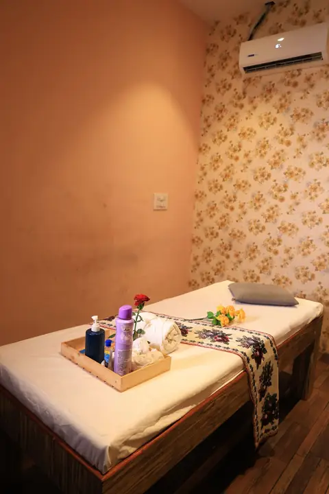Thai massage room with fresh linen and oils